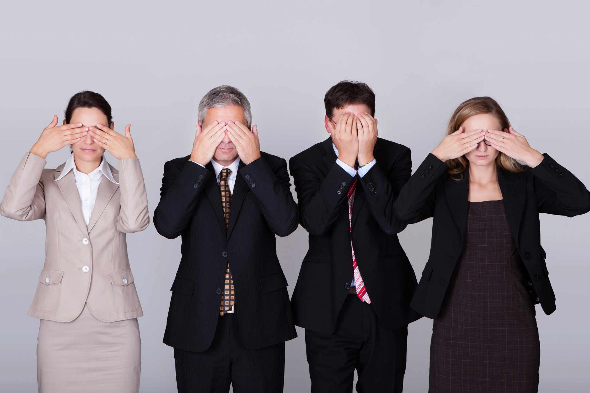 Four government employees covering their eyes with their hands, symbolizing willful ignorance or refusal to see public health risks.