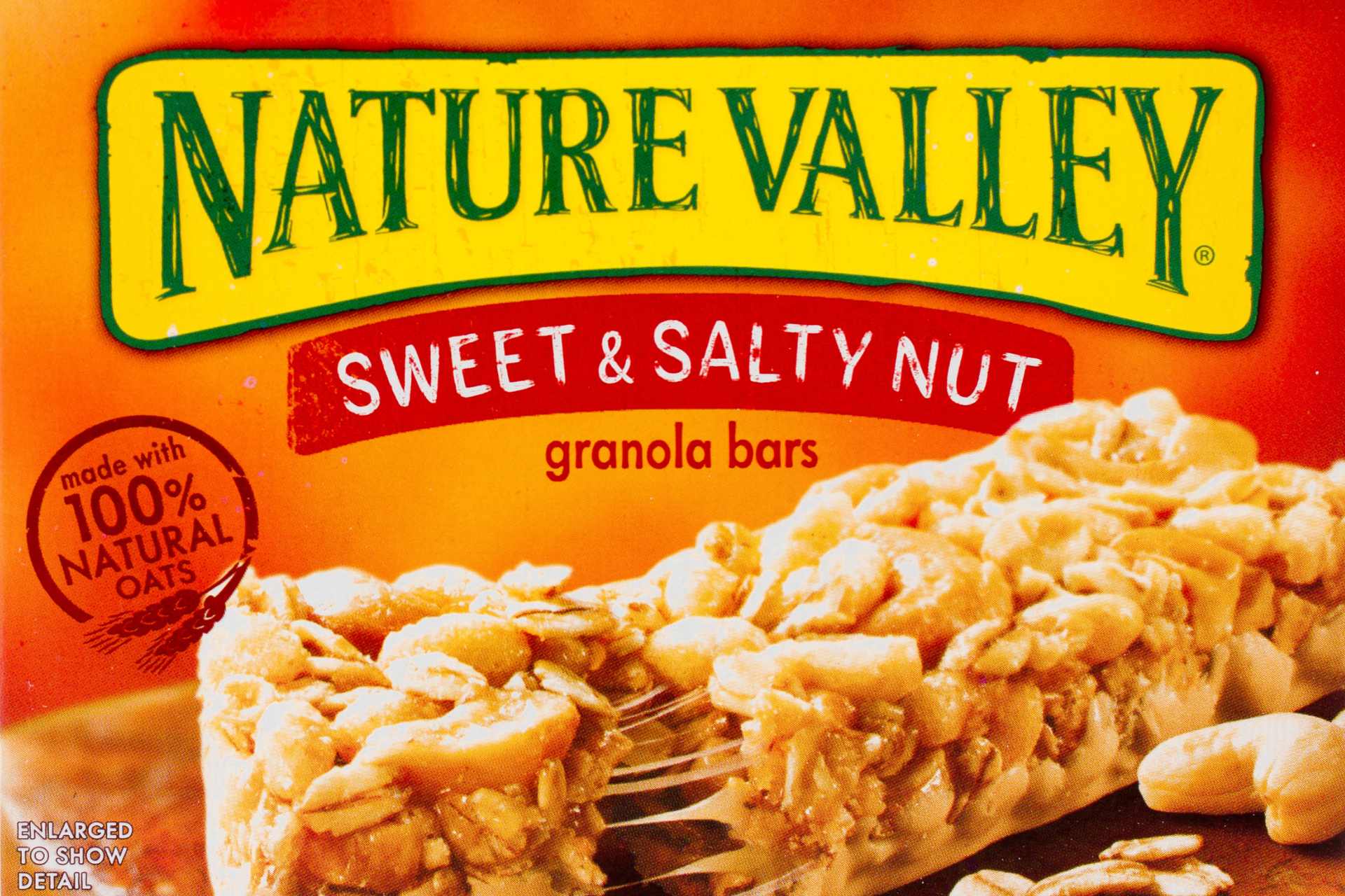 Box of Nature Valley Sweet & Salty Nut granola bars with “100% Natural” label — a product later found to contain trace glyphosate, prompting legal action and label changes.