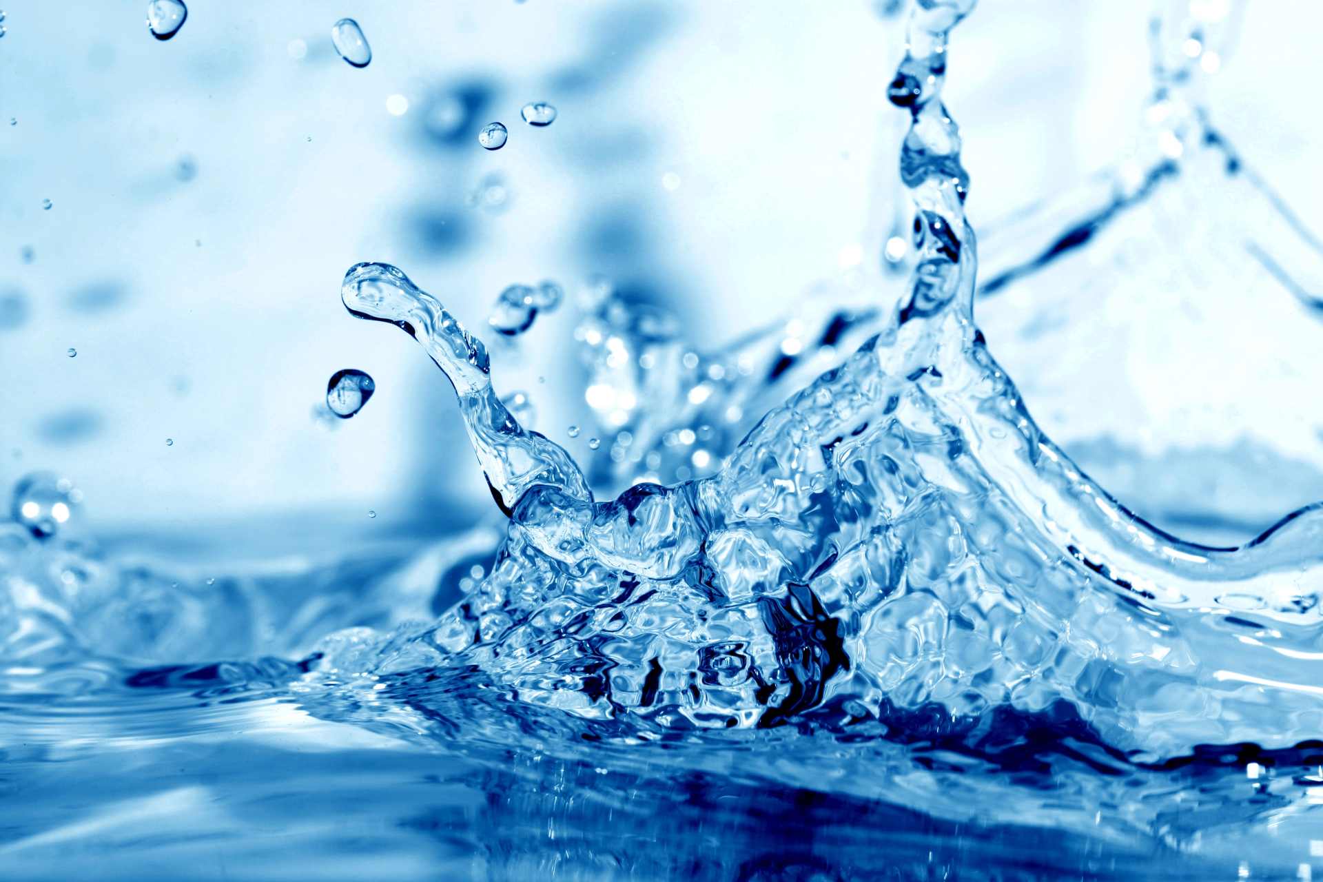 Close-up of a splash of water, symbolizing pesticide contamination in drinking water and environmental exposure.