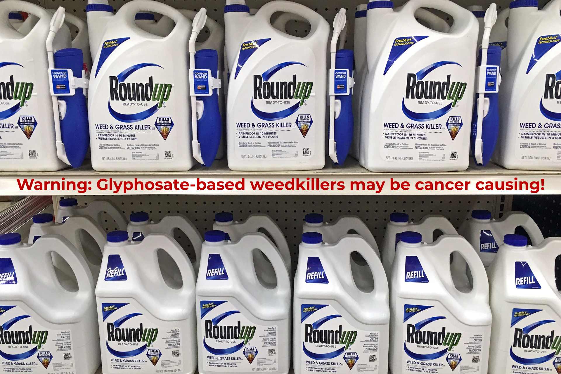 Store shelf lined with multiple bottles of Roundup weed killer. A bold warning sign on the shelf reads: “Warning: Glyphosate (Roundup) may be cancer causing!” highlighting the need for consumer right-to-know labeling.