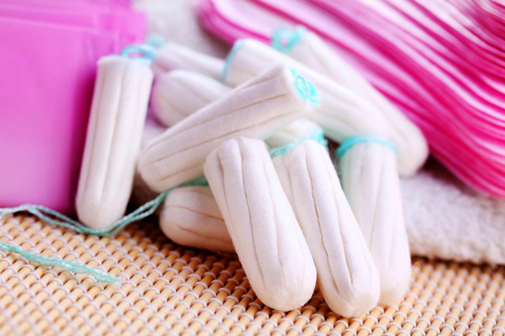 Close-up of a cluster of white tampons, highlighting concerns about glyphosate residues in feminine hygiene products.