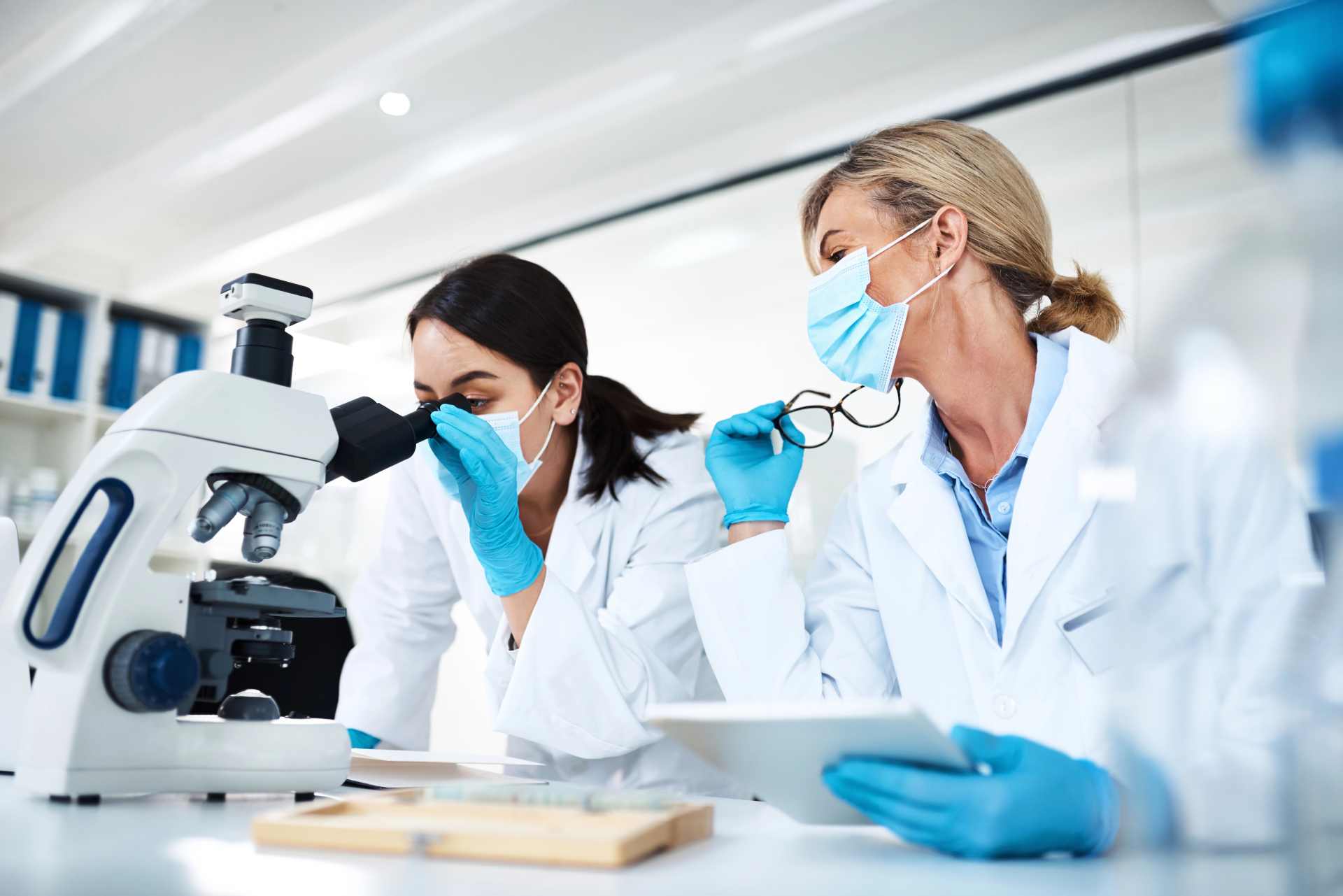 Scientists reviewing laboratory test results used in pesticide residue exposure assessment