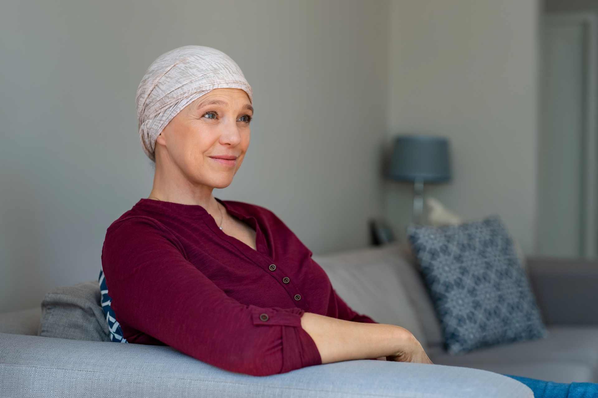 Portrait of a senior woman in a headscarf recovering from breast cancer treatment