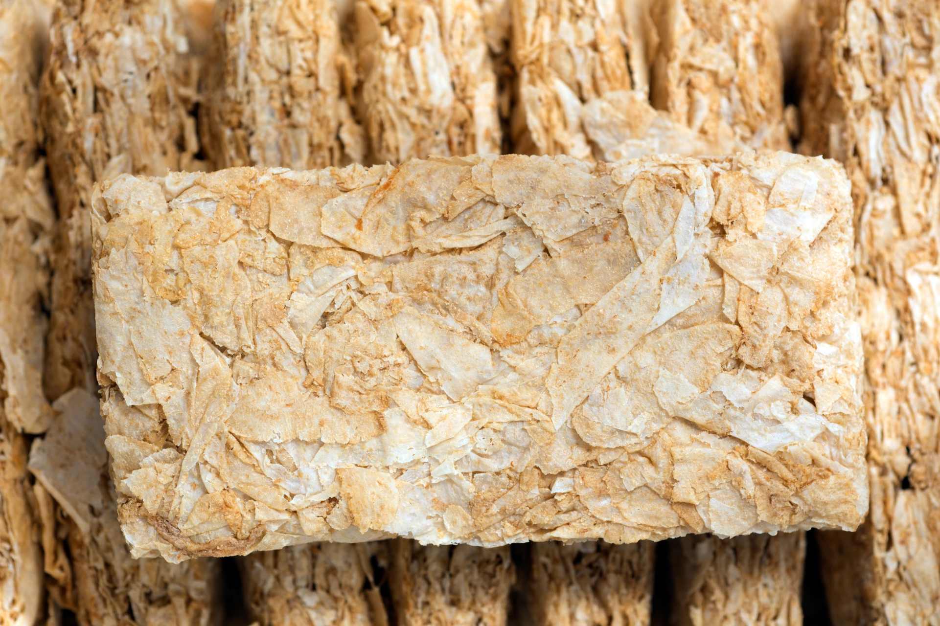 Close-up of wheat biscuit cereal stacked together, representing Weet-Bix-style products tested for glyphosate residues